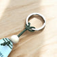Nature Sets The Pace Keyring – Retro Motel Style Boho Keychain with Watercolour Male Mountain Biker Design, Gift for Cyclists & Outdoor Lovers