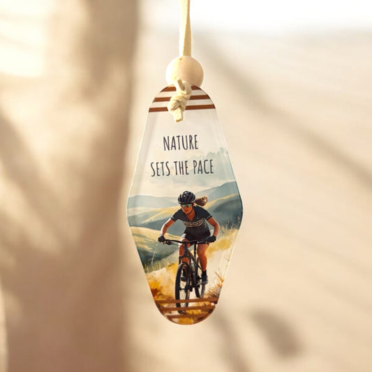 Nature Sets The Pace Keyring – Retro Motel Style Boho Keychain with Watercolour Female Mountain Biker Design, Gift for Cyclists & Outdoor Lovers