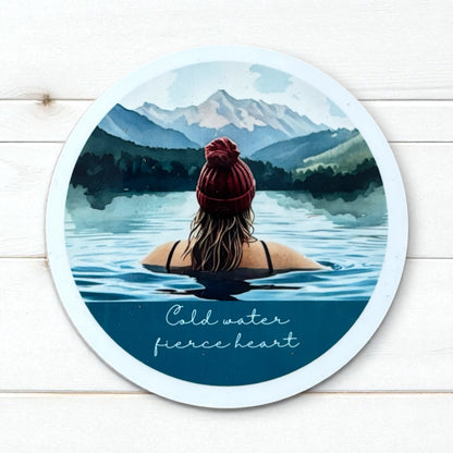 Cold Water, Fierce Heart Round Coaster – Wild Swimmer in Lake with Bobble Hat (Blonde or Brunette) | Outdoor Swim Décor