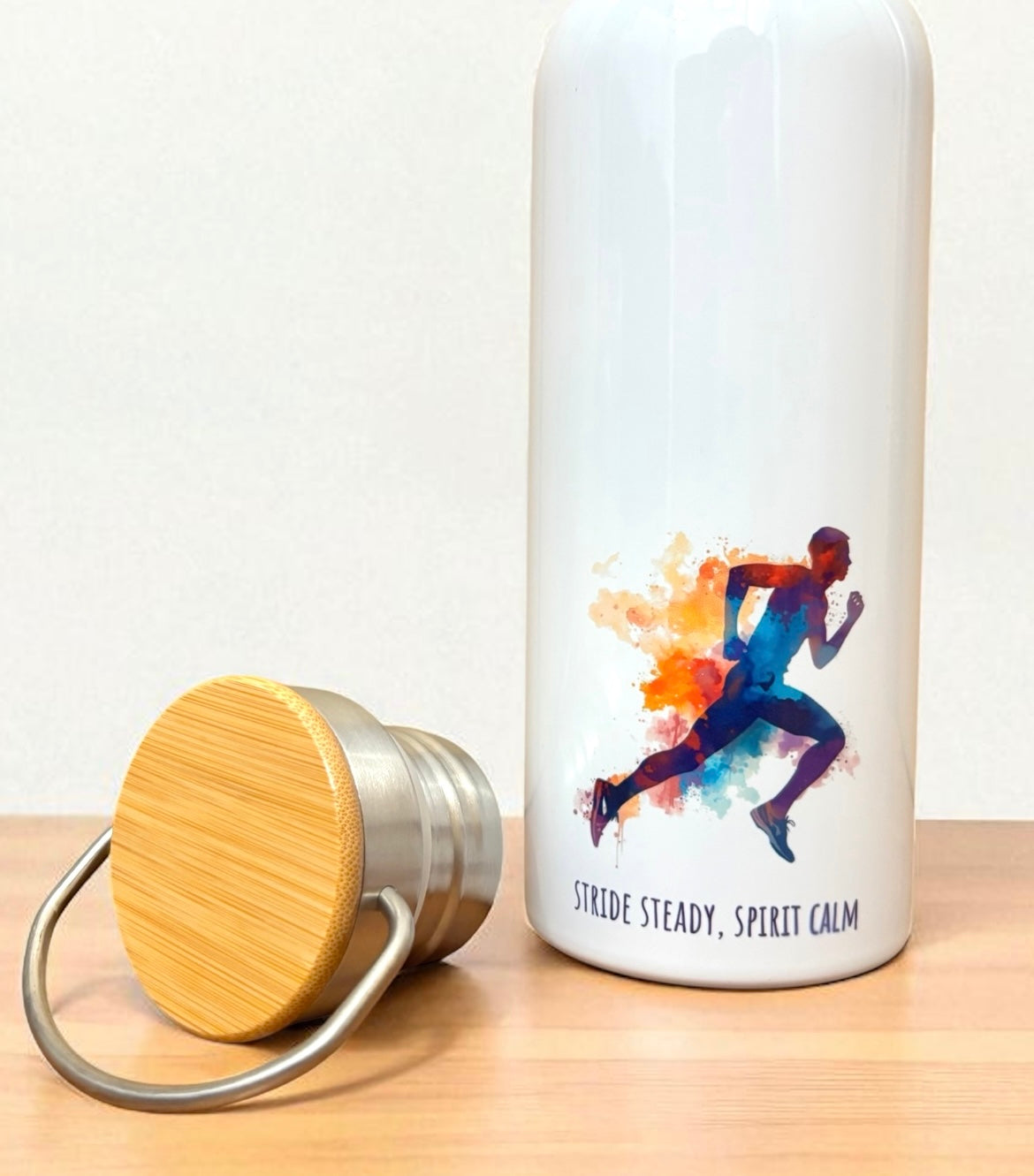 Stride Steady Spirit Calm Metal Water Bottle – 500ml Stainless Steel Insulated Flask with Rainbow Watercolour Male Runner Design