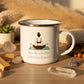 White mug with a yoga-themed design and text on a wooden surface.