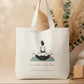 Tote bag with a yoga-themed design and text on a light surface.