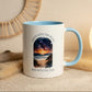 Mug with a scenic design and text, surrounded by small potted plants on a light background