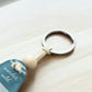 Wander Wild, Breathe Easy Keyring – Retro Motel Style Boho Keychain with Watercolour Mountains, Sun & Hiker Design, Gift for Outdoor Lovers