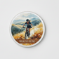 Nature Sets The Pace Round Coaster – Female Mountain Biker Watercolour Design | Adventure & Outdoor Décor
