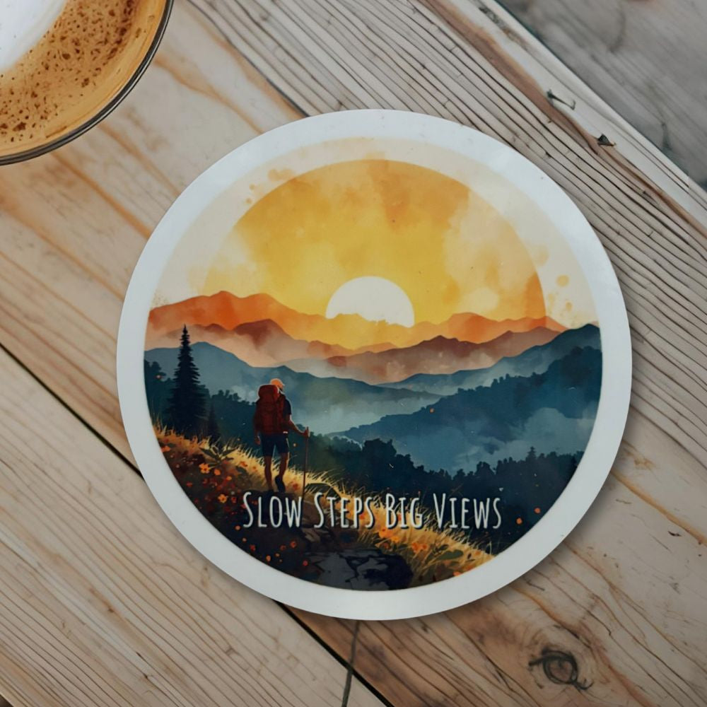Slow Steps, Big Views Round Coaster – Watercolour Mountain Hiker Design | Adventure & Nature Décor