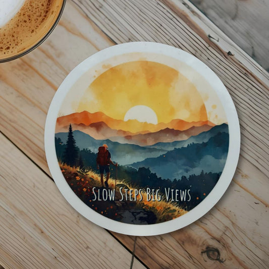 Slow Steps, Big Views Round Coaster – Watercolour Mountain Hiker Design | Adventure & Nature Décor