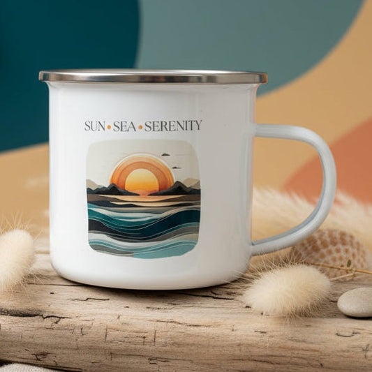 White mug with sunset design and 'Sun Sea Serenity' text on a light gray background